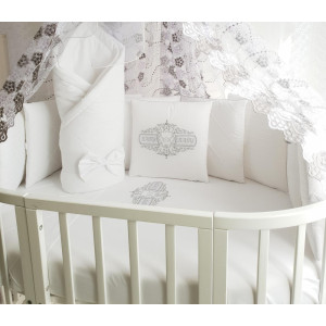 Универсальный комплект в кроватку Odelis белый