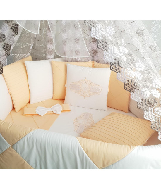 Универсальный комплект в кроватку Odelis персик